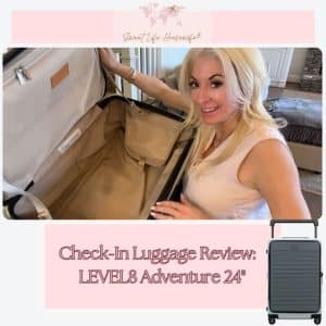 Girl with top opening luggage with beige interior, 2 tone blueish green exterior pictured in lower right corner. Text says Check-In Luggage Review: LEVEL8 Adventure 24"
