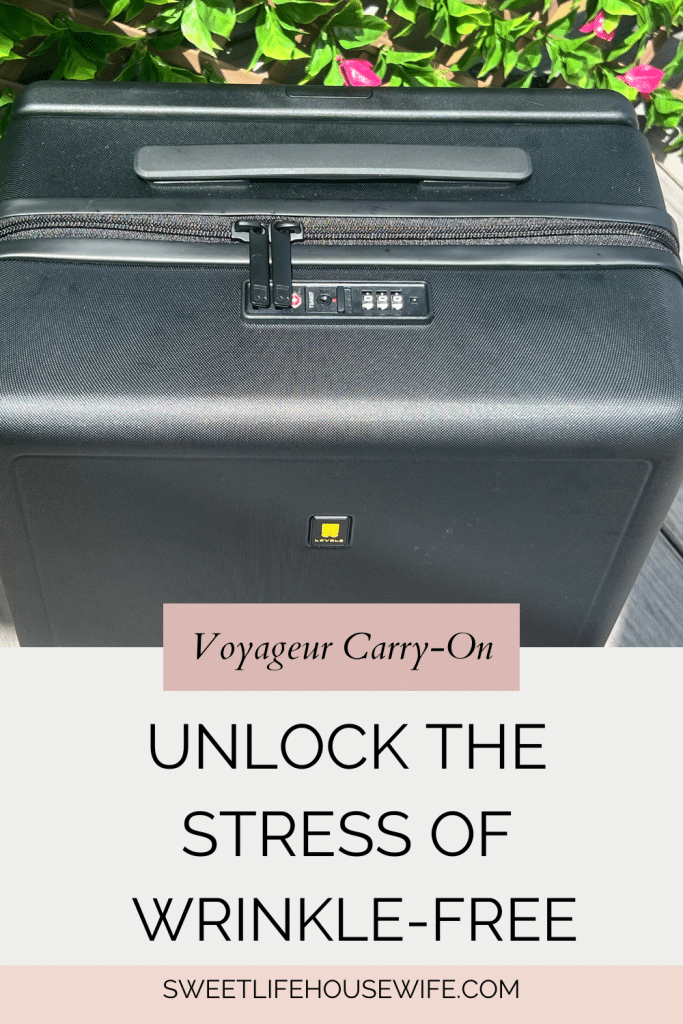 Black Level8 suitcase showing top view of streamlined handle, zippers and TSA lock with Level8 logo visible. Text reads Voyageur Carry-on, Unlock the stress of Wrinkle-Free, sweetlifehousewife.com
