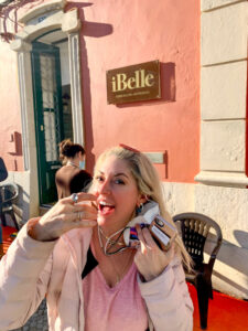 Eating a chocolate outside in Portugal wearing a puffer jacket