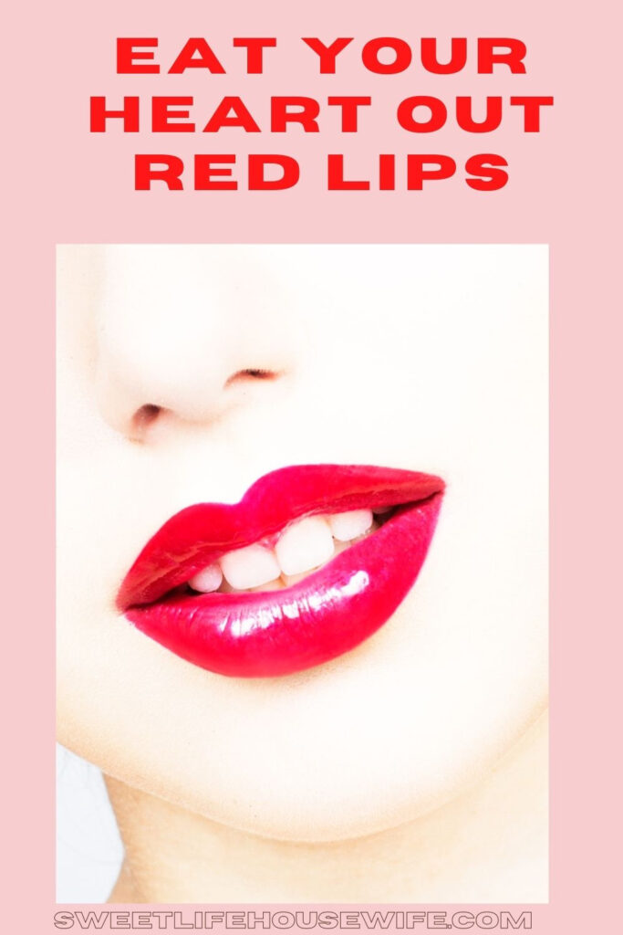 Bright red lipstick on a person with pale skin